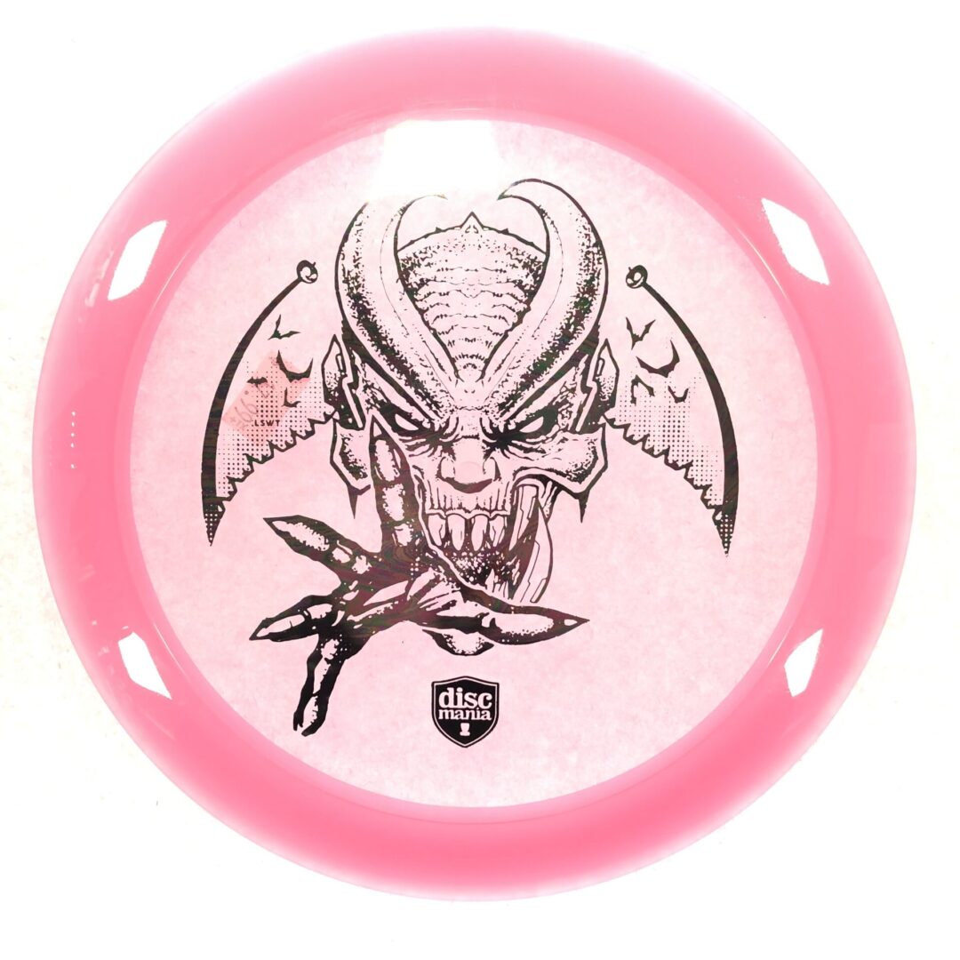 A pink circle with a devil logo