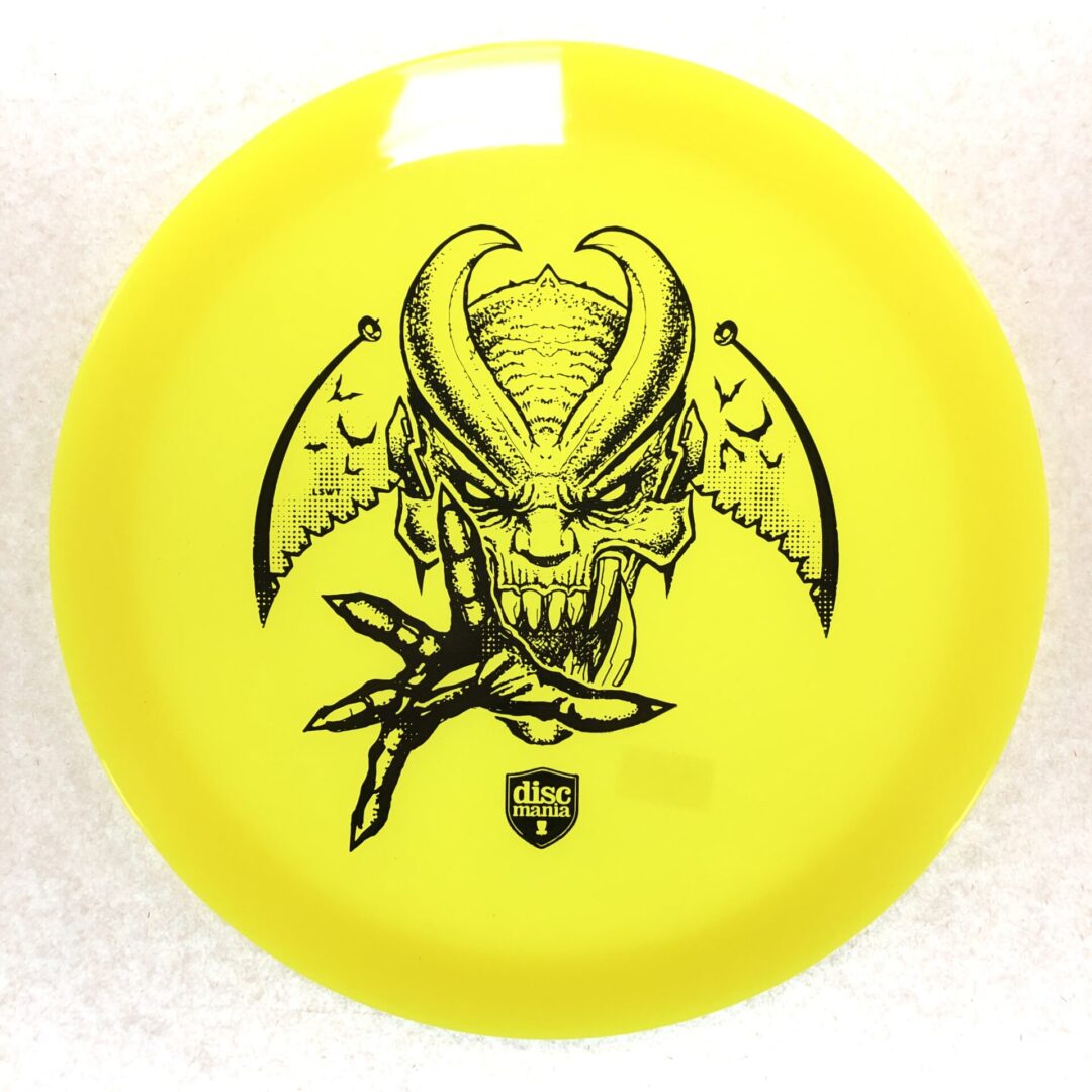A yellow circle with a devil logo